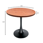 This 36-inch round dining table seats four, featuring a medium-density fiberboard tabletop and a stylish black iron base, suitable for both kitchen and dining areas.